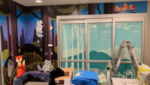 A wall mural of cartoon forest animals in BC Children's Hospital.